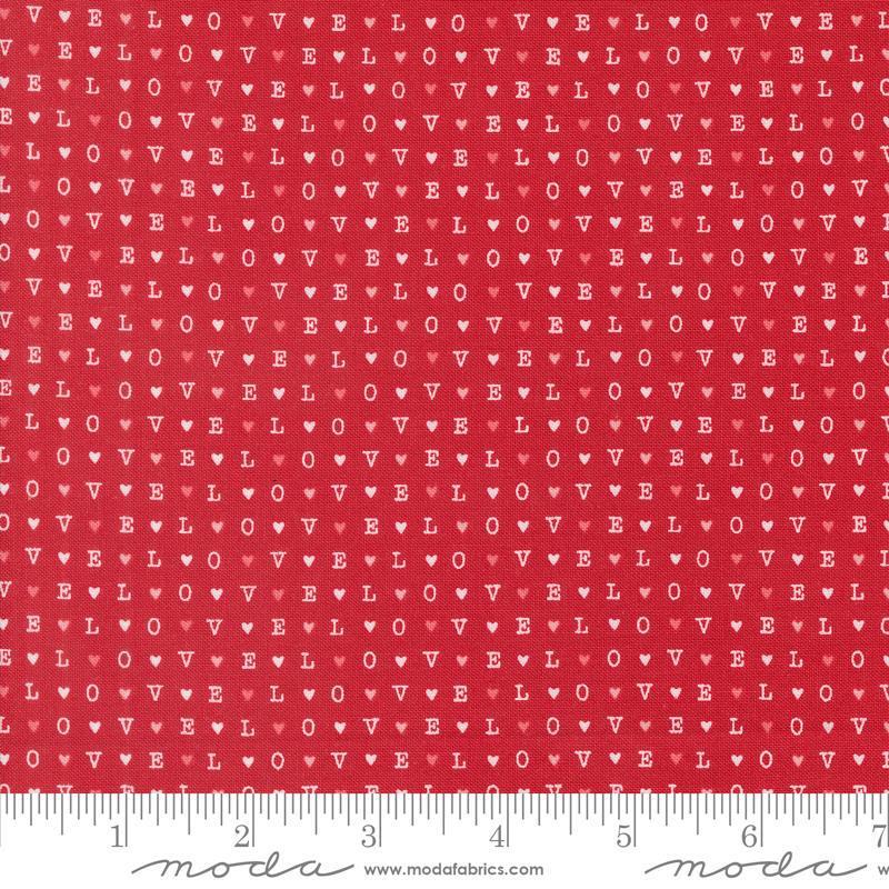 Image of the Love Blooms LOVE Rose quilting cotton fabric by Moda Fabrics. Features the word LOVE on a red background. Cute Little Fabric Shop
