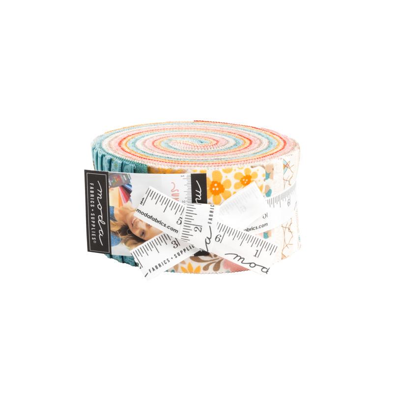 Image of the Sunday Brunch rolie polie by BasicGrey for Moda Fabrics. Features floral fabric with floral patterns. 
Cute Little Fabric Shop