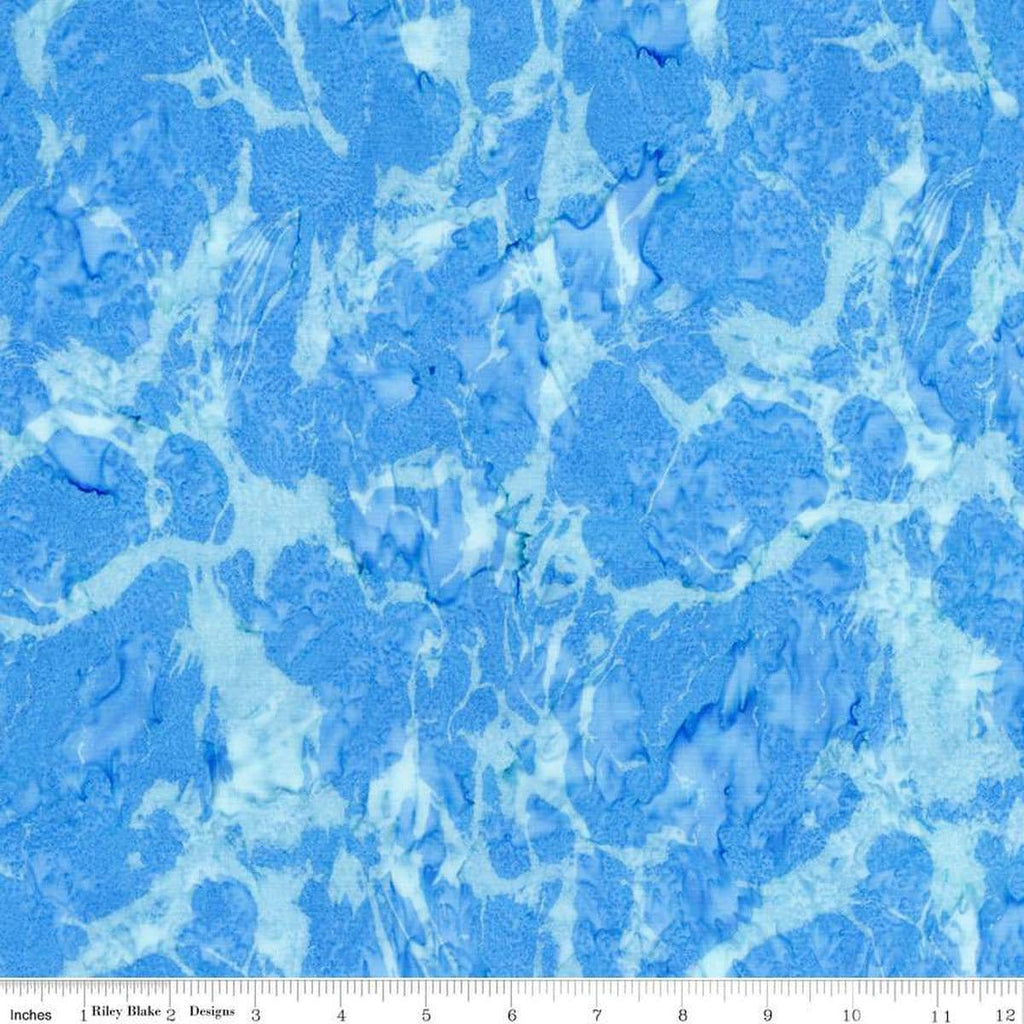 Image of the Batiks Toes in the Sand Baby Blue quilting cotton batik fabric. Features abstract hand-dyed patterns. Cute Little Fabric Shop