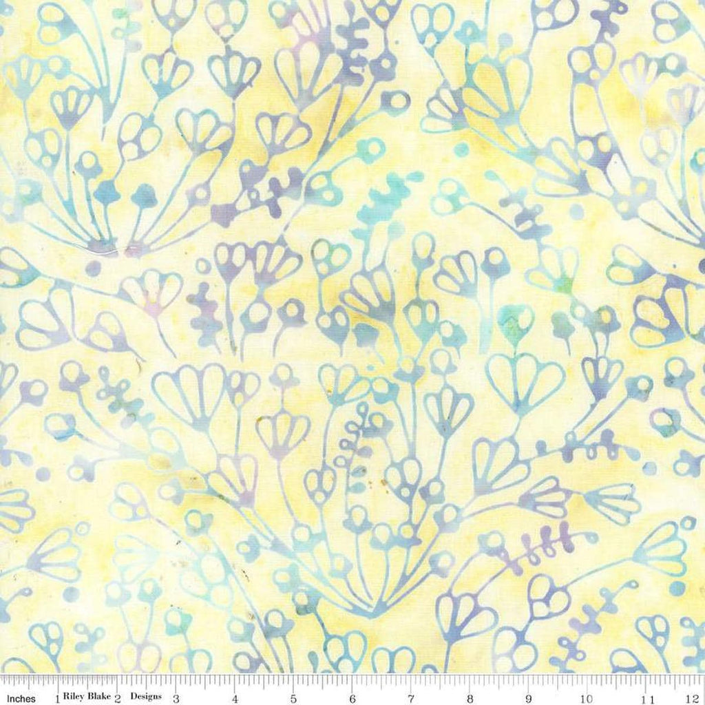 Image of the Expressions Batiks Sassy and Tweet Yellow Cream quilting cotton fabric. Features an abstract design on a white background. Cute Little Fabric Shop