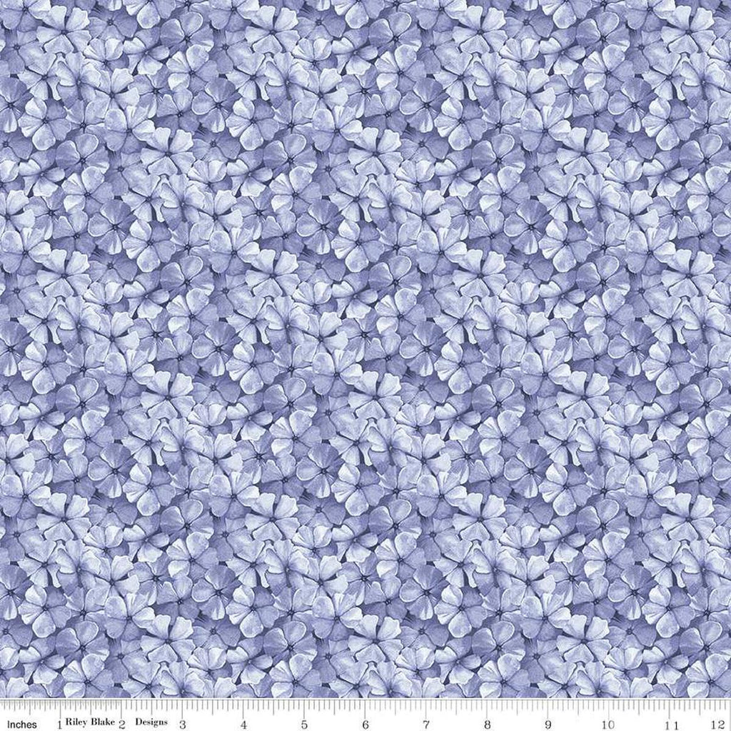 Image of the Sewing Seeds III Phlox Petals Periwinkle quilting cotton fabric by Lori Holt for Riley Blake Designs. Features flowers on a purple background. Cute Little Fabric Shop