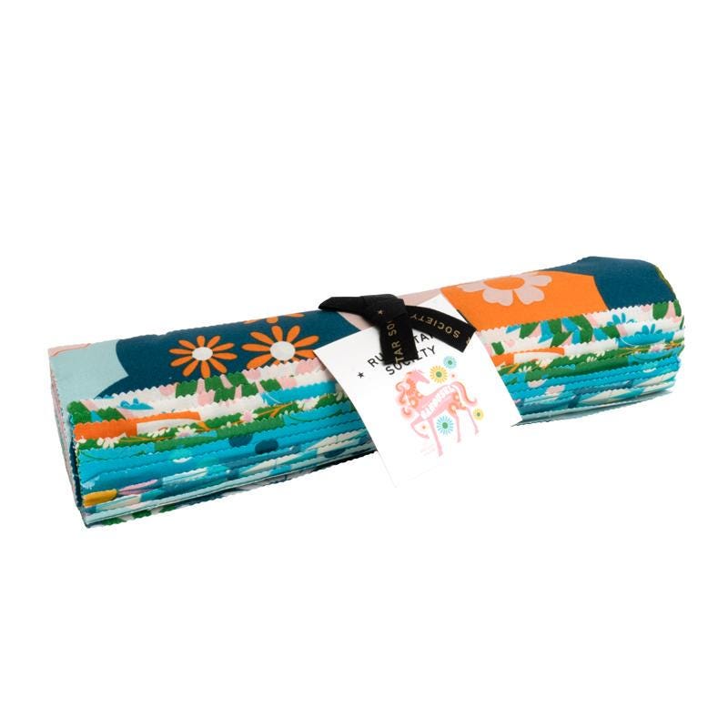 Image of the Carousel layer cake by Ruby Star Society for Moda Fabrics. Features bright colored fabrics. 
Cute Little Fabric Shop