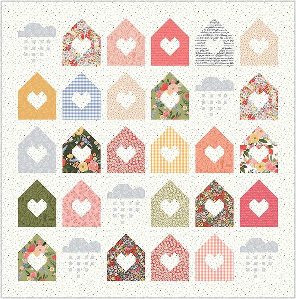Image of the Silver Lining Quilt Boxed Kit by Riley Blake Designs. Features houses with hearts in the center on a quilt. 
Cute Little Fabric Shop