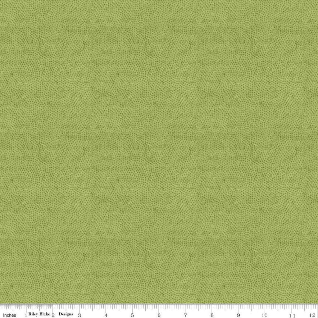 Image of the Sewing Seeds III Stipple Green quilting cotton fabric by Lori Holt for Riley Blake Designs. Features dots on a green background. Cute Little Fabric Shop