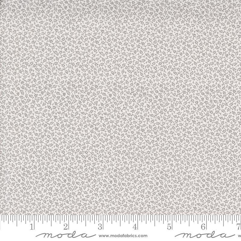 Image of the Itty Bitty Background Gatherings Little Leaf Gray quilting cotton fabric by Moda Fabrics. Features leaves on a gray background. Cute Little Fabric Shop