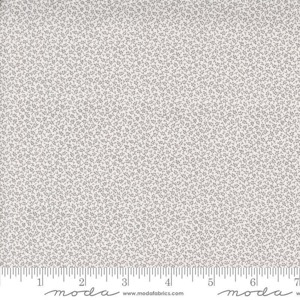 Image of the Itty Bitty Background Gatherings Little Leaf Gray quilting cotton fabric by Moda Fabrics. Features leaves on a gray background. Cute Little Fabric Shop