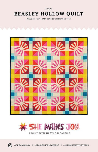 Image of the Beasley Hollow Quilt quilt pattern by She Makes Joy for Moda Fabrics. Features a quilt with many different patterned blocks.
Cute Little Fabric Shop