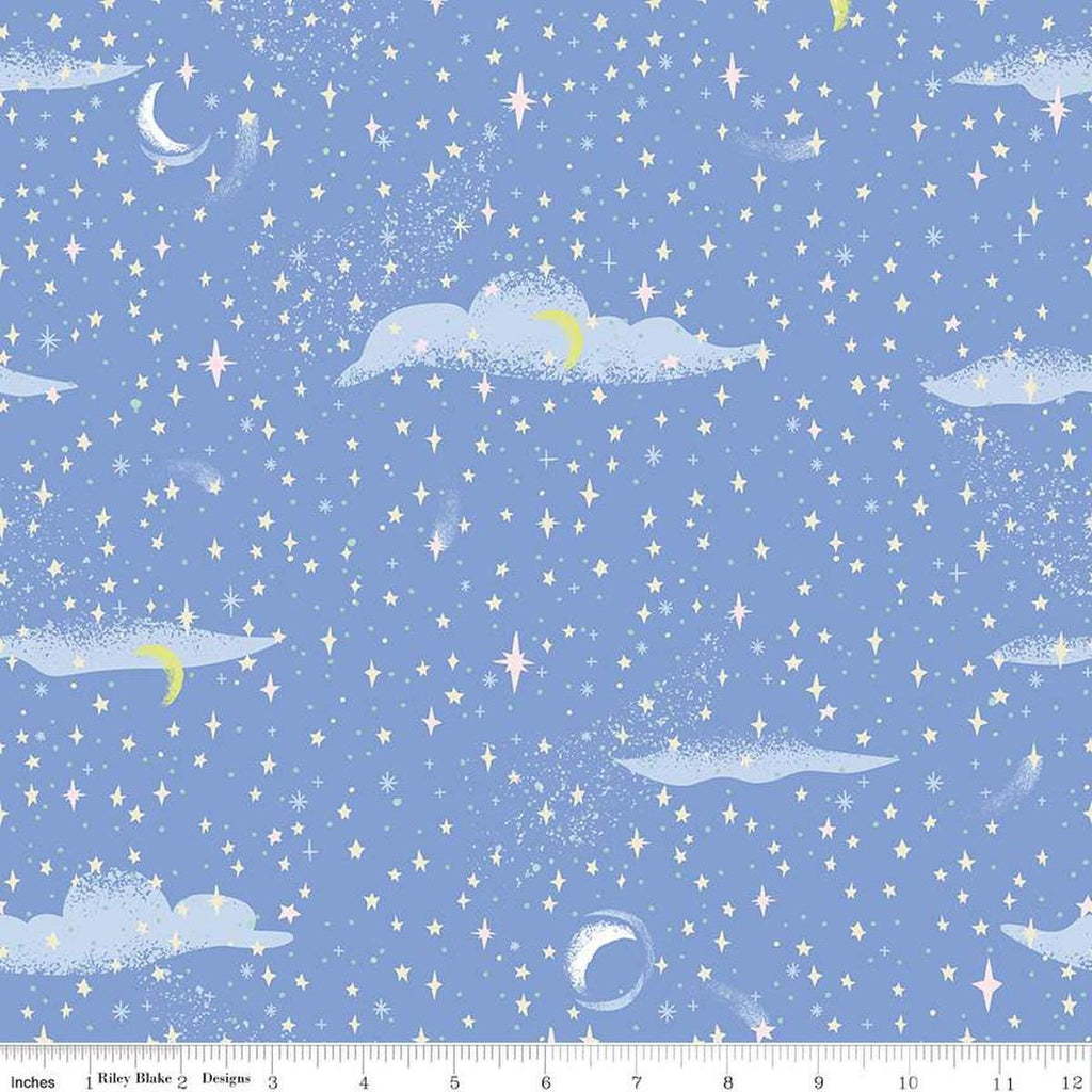 Image of the Forever Neverland Pixie Dust Periwinkle quilting cotton fabric by Jill Howarth for Riley Blake Designs. Features a sky on a purple background. Cute Little Fabric Shop