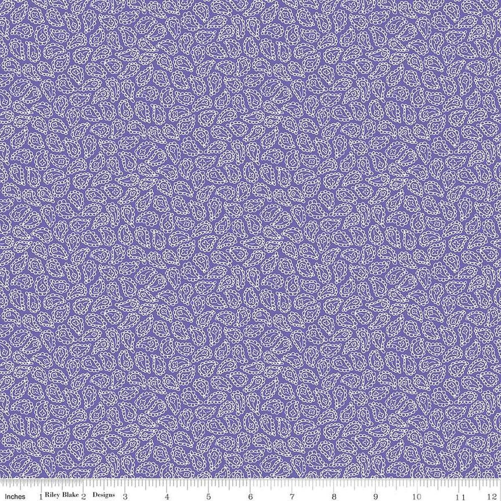 Image of the Vibrance Paisley Periwinkle quilting cotton fabric by Leslie Ryan for Riley Blake Designs. Features flowers on a purple background. Cute Little Fabric Shop