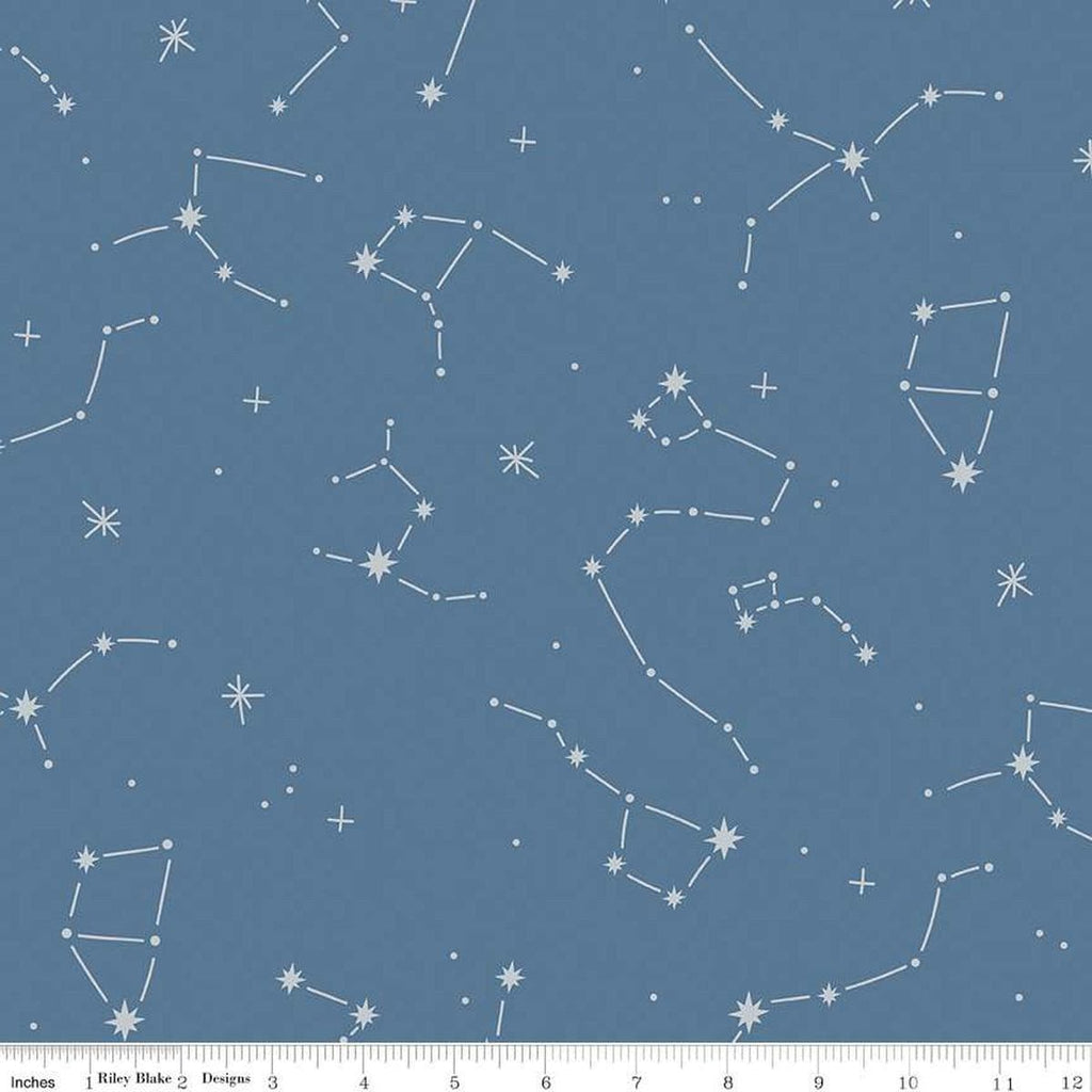 Image of the Hoist the Sails Constellation Denim quilting cotton fabric by Rachel Erickson for Riley Blake Designs. Features stars on a blue background. 
Cute Little Fabric Shop
