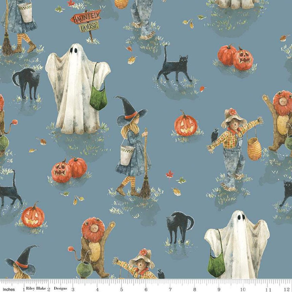 Image of the Trick or Treat Main Dusk quilting cotton fabric by Lisa Audit for Riley Blake Designs. Features halloween icons on a blue background. Cute Little Fabric Shop