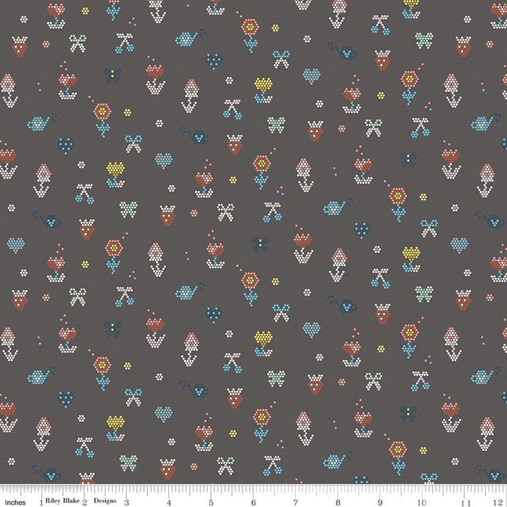 Image of the Sunsetridge Mosaic Granite quilting cotton fabric by Minki Kim for Riley Blake Designs. Features pixels on a brown background. Cute Little Fabric Shop