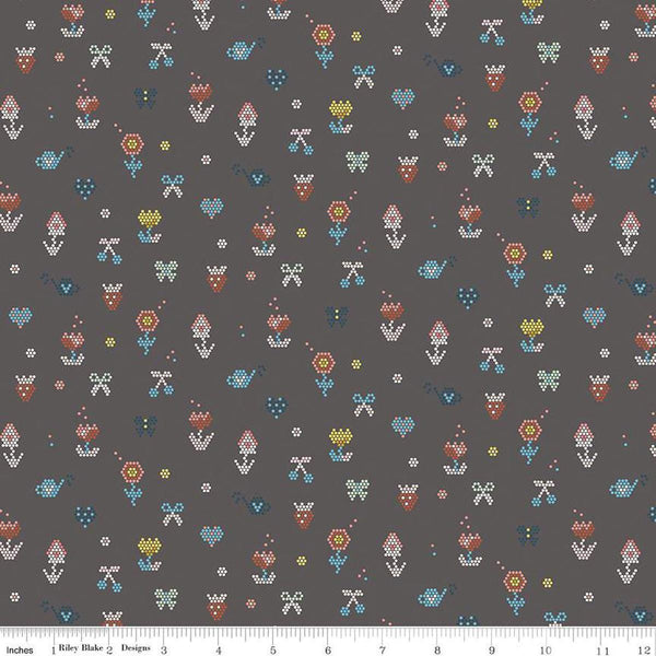 Image of the Sunsetridge Mosaic Granite quilting cotton fabric by Minki Kim for Riley Blake Designs. Features pixels on a brown background. Cute Little Fabric Shop