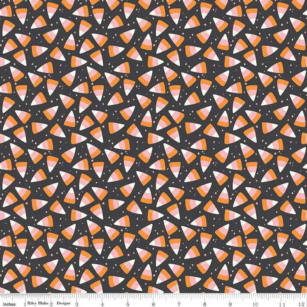 Image of the Hey Pumpkin Corn Candy Charcoal quilting cotton fabric by Riley Blake Designs. Features candy on a black background. Cute Little Fabric Shop