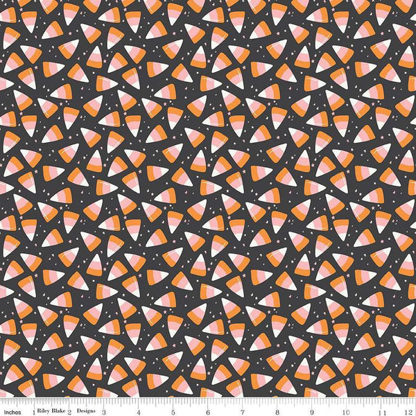 Image of the Hey Pumpkin Corn Candy Charcoal quilting cotton fabric by Riley Blake Designs. Features candy on a black background. Cute Little Fabric Shop