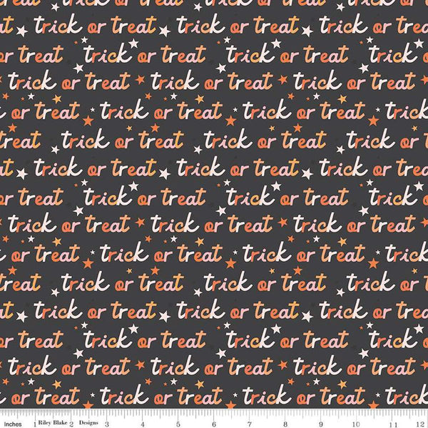 Image of the Hey Pumpkin Trick or Treat Charcoal quilting cotton fabric by Riley Blake Designs. Features text on a black background. Cute Little Fabric Shop