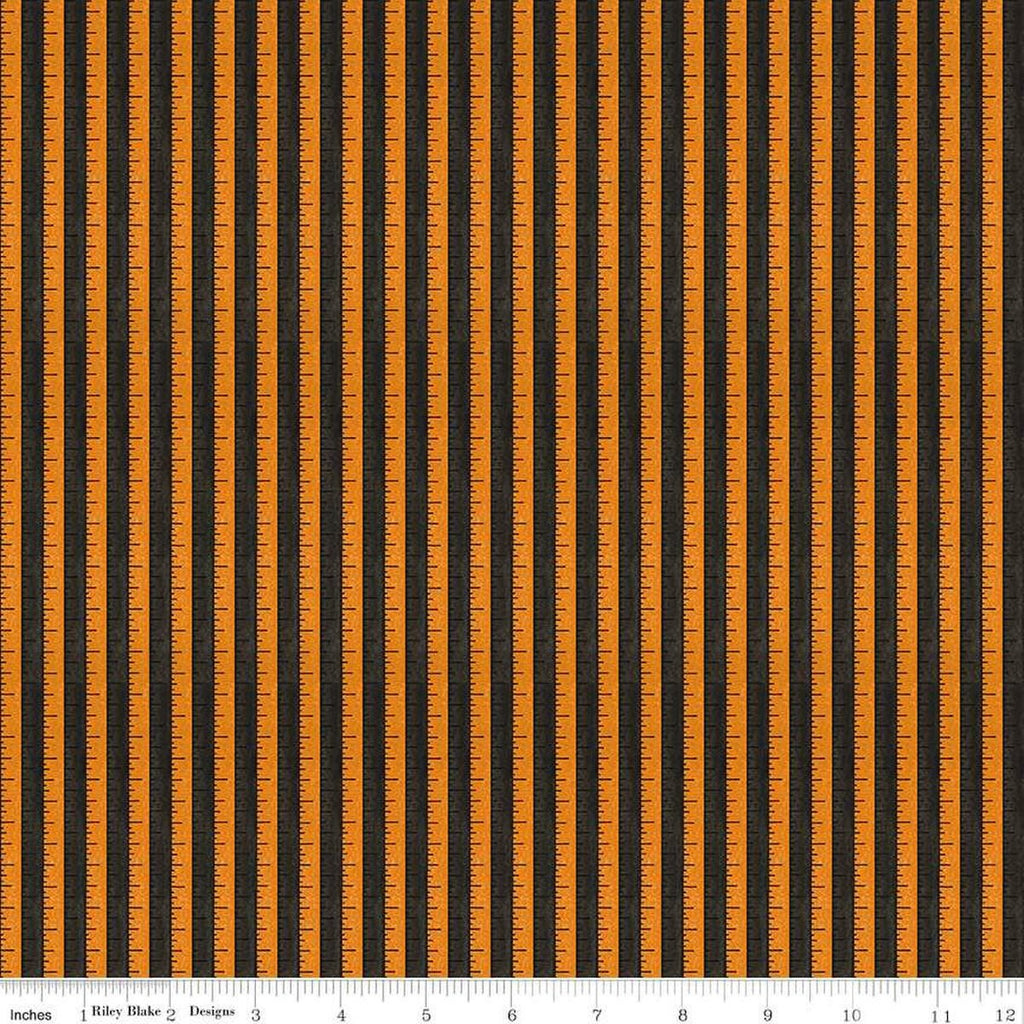 Image of the Costume Maker's Act II Tape Measure Black quilting cotton fabric. Features rulers on a black background. Cute Little Fabric Shop