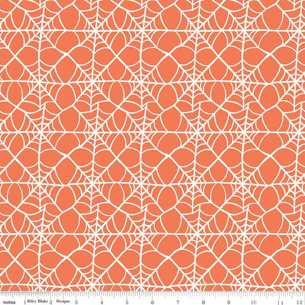 Image of the Hey Pumpkin Webs Orange quilting cotton fabric by Riley Blake Designs. Features webs on an orange background. Cute Little Fabric Shop