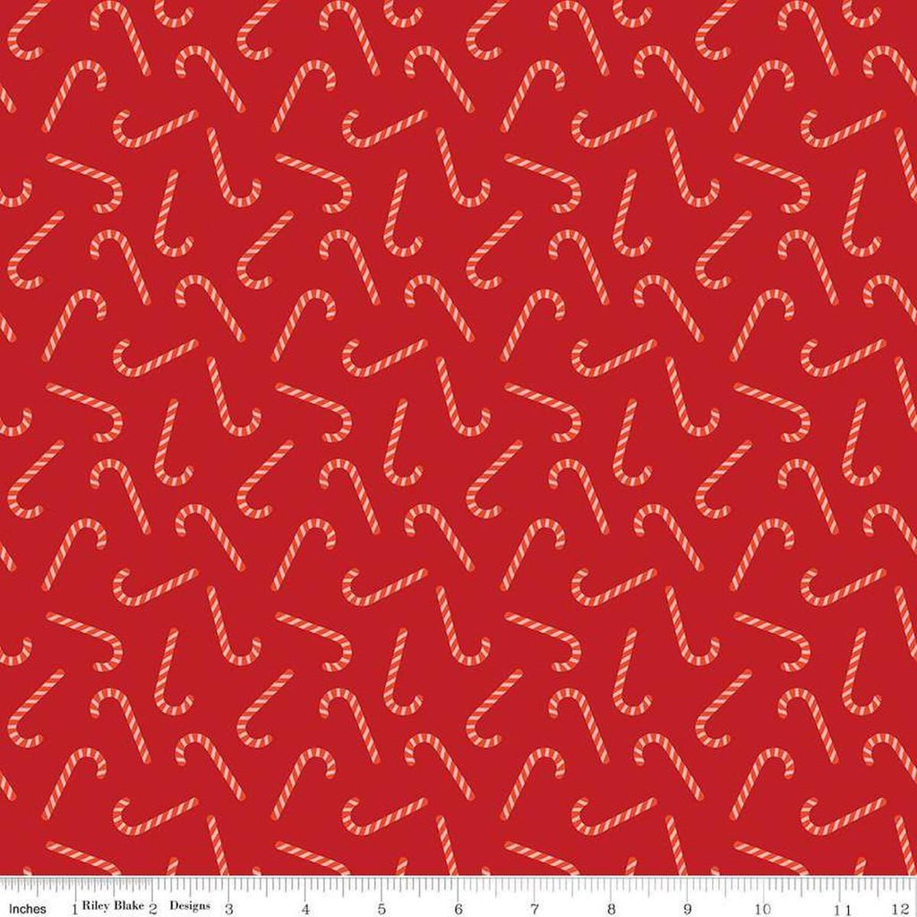 Image of the Flannel Candy Canes Red quilting cotton fabric by Riley Blake Designs. Features candy canes on a red background. Cute Little Fabric Shop