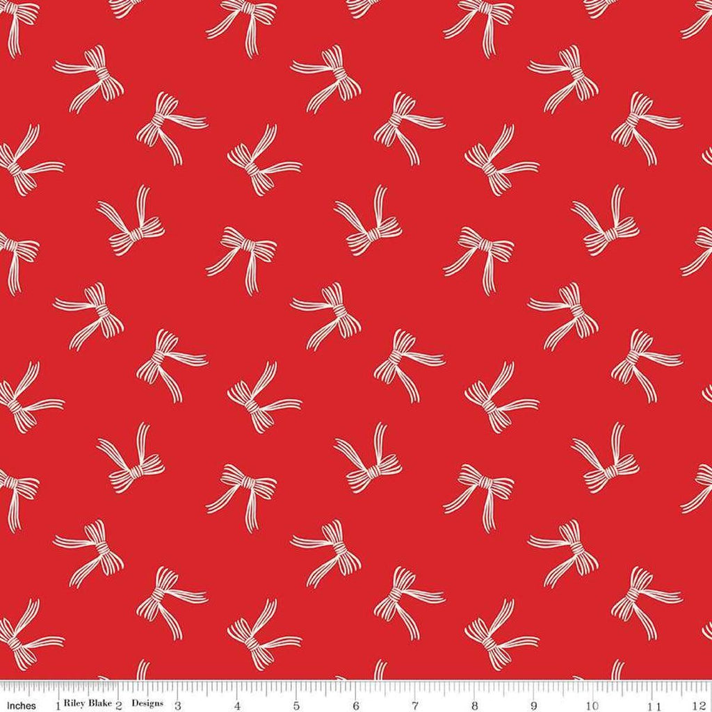 Image of the Flannel Bows Red quilting cotton fabric by Riley Blake Designs. Features bows on a re background. Cute Little Fabric Shop