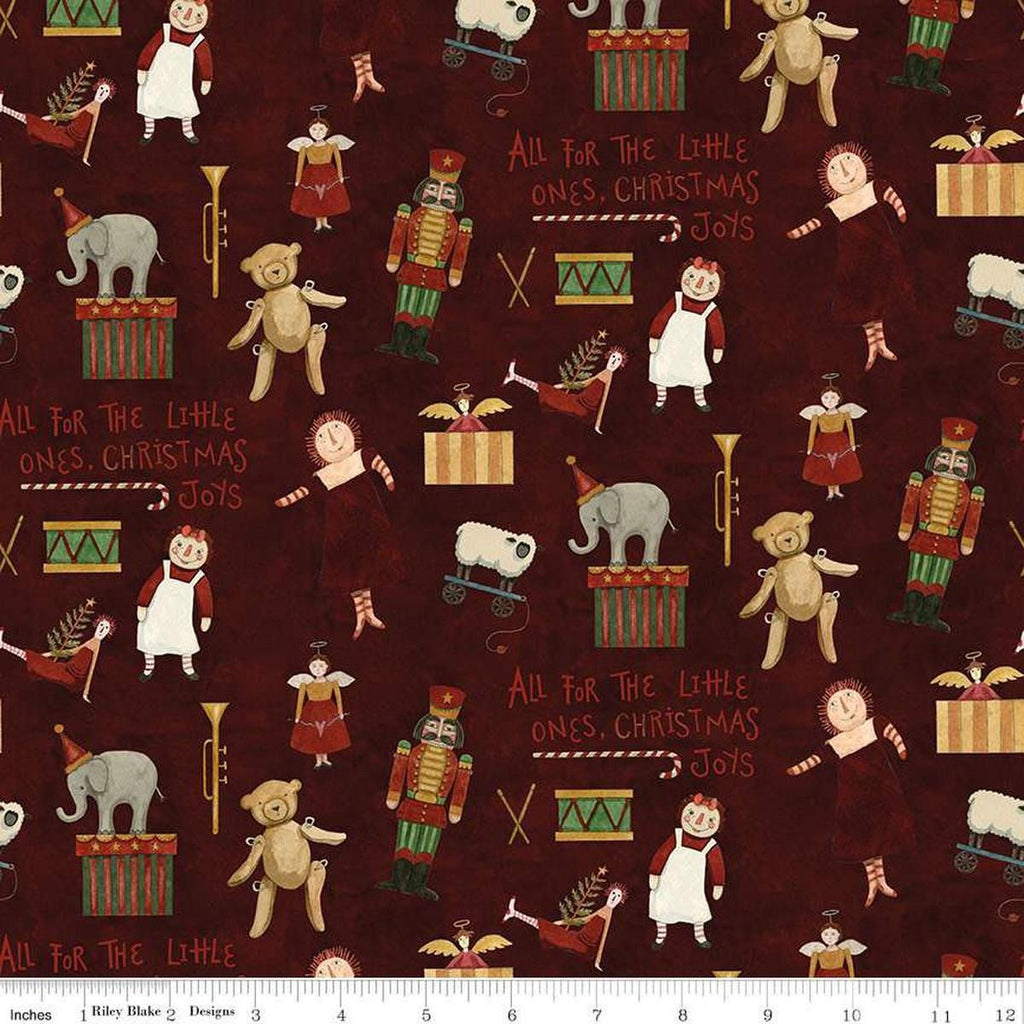 Image of the Naughty and Nice Toys Cranberry quilting cotton fabric by Riley Blake Designs. Features toys on a red background. Cute Little Fabric Shop