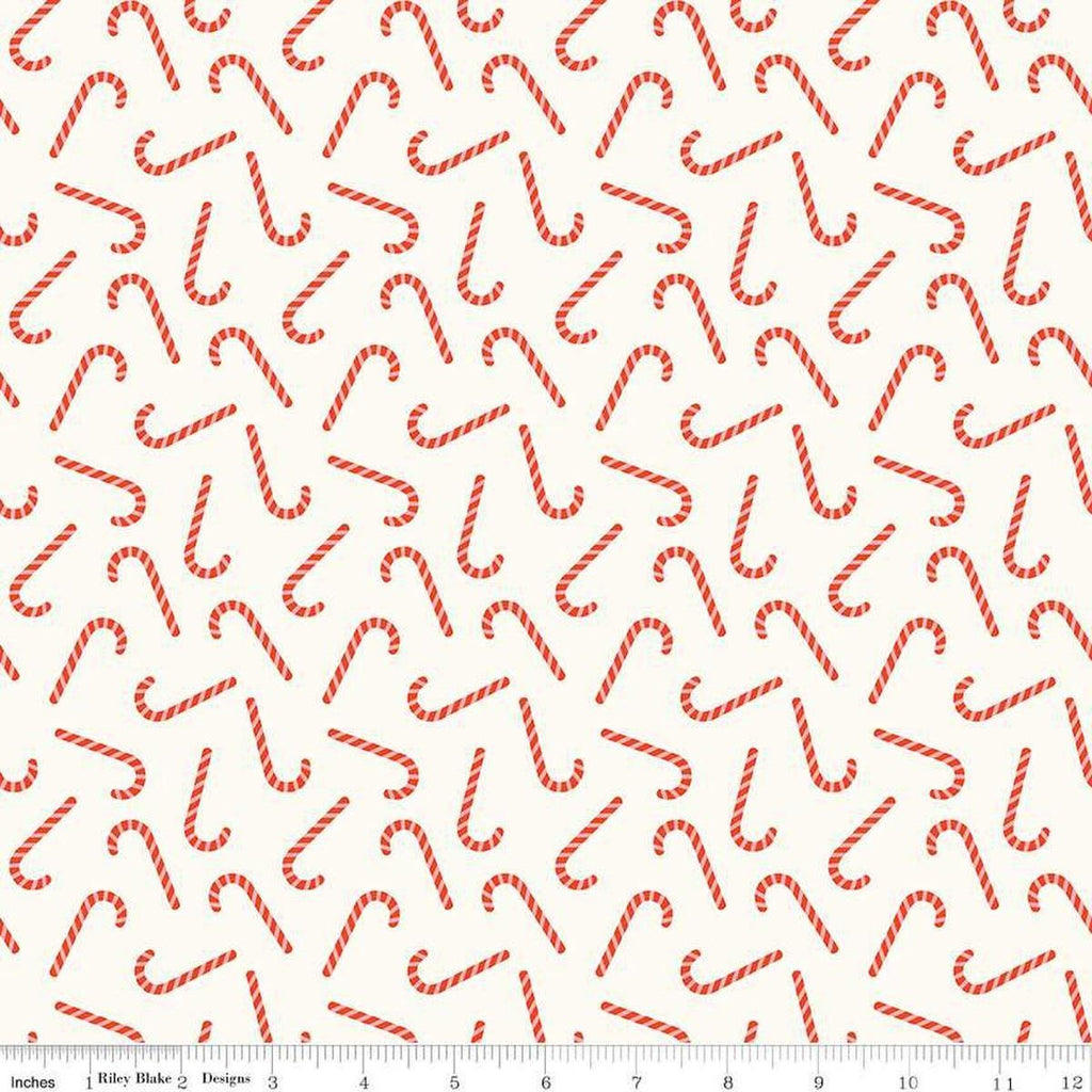 Image of the Flannel Candy Canes Cream quilting cotton fabric by Riley Blake Designs. Features candy canes on a cream background. Cute Little Fabric Shop