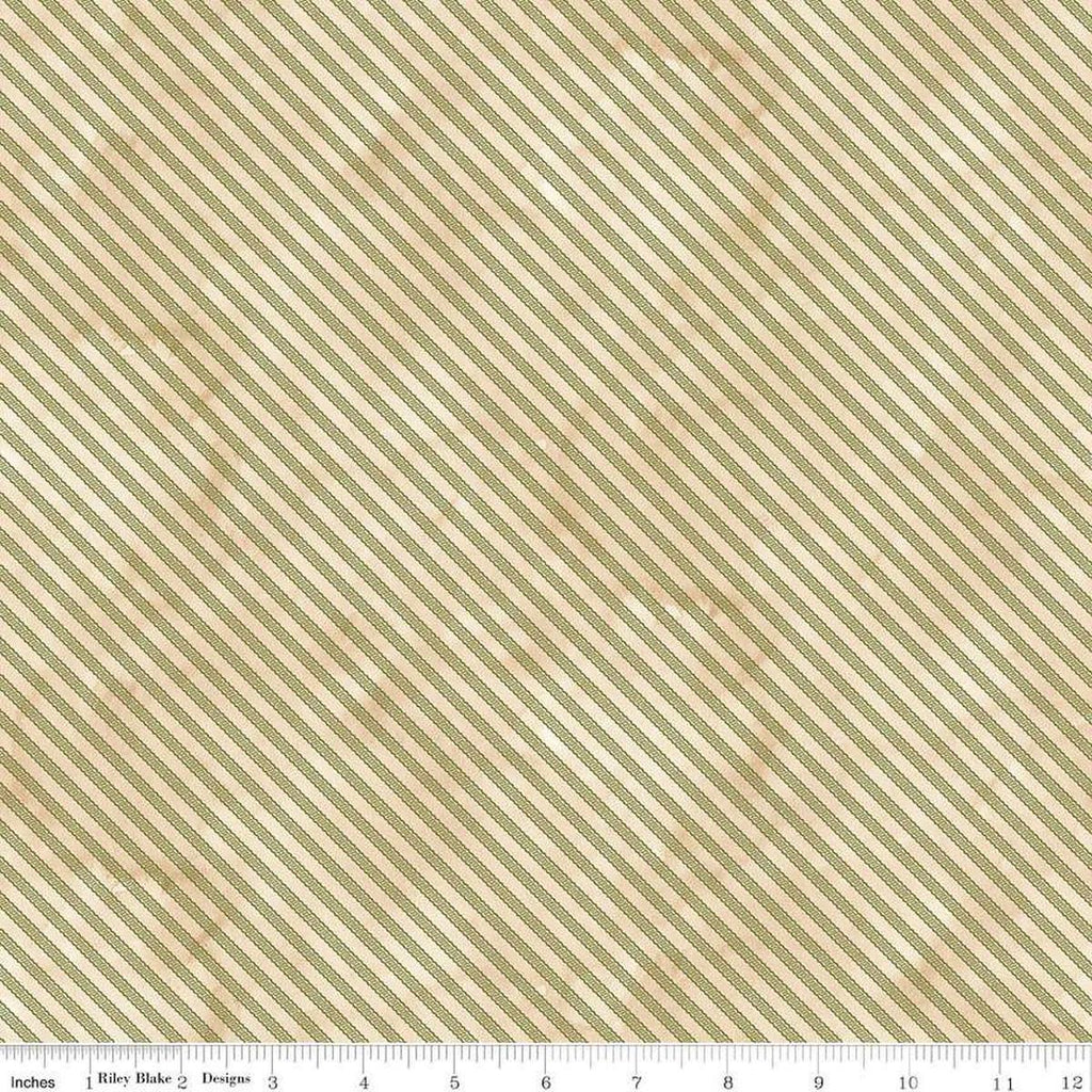 Image of the Naughty and Nice Ticking Green quilting cotton fabric by Riley Blake Designs. Features stripes on a green background. Cute Little Fabric Shop