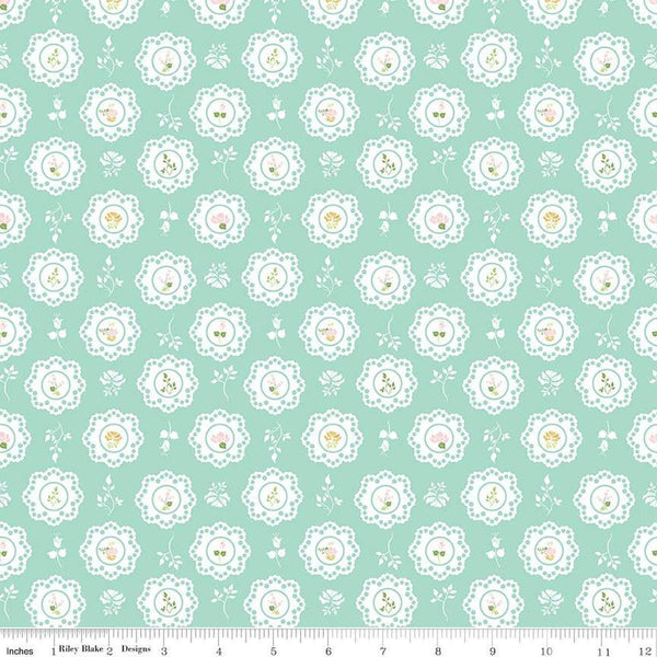 Image of the Summer Skies and Fireflies Doilies Aqua Quilting Cotton Fabric by Riley Blake Designs. Features flowers on a blue background. Cute Little Fabric Shop