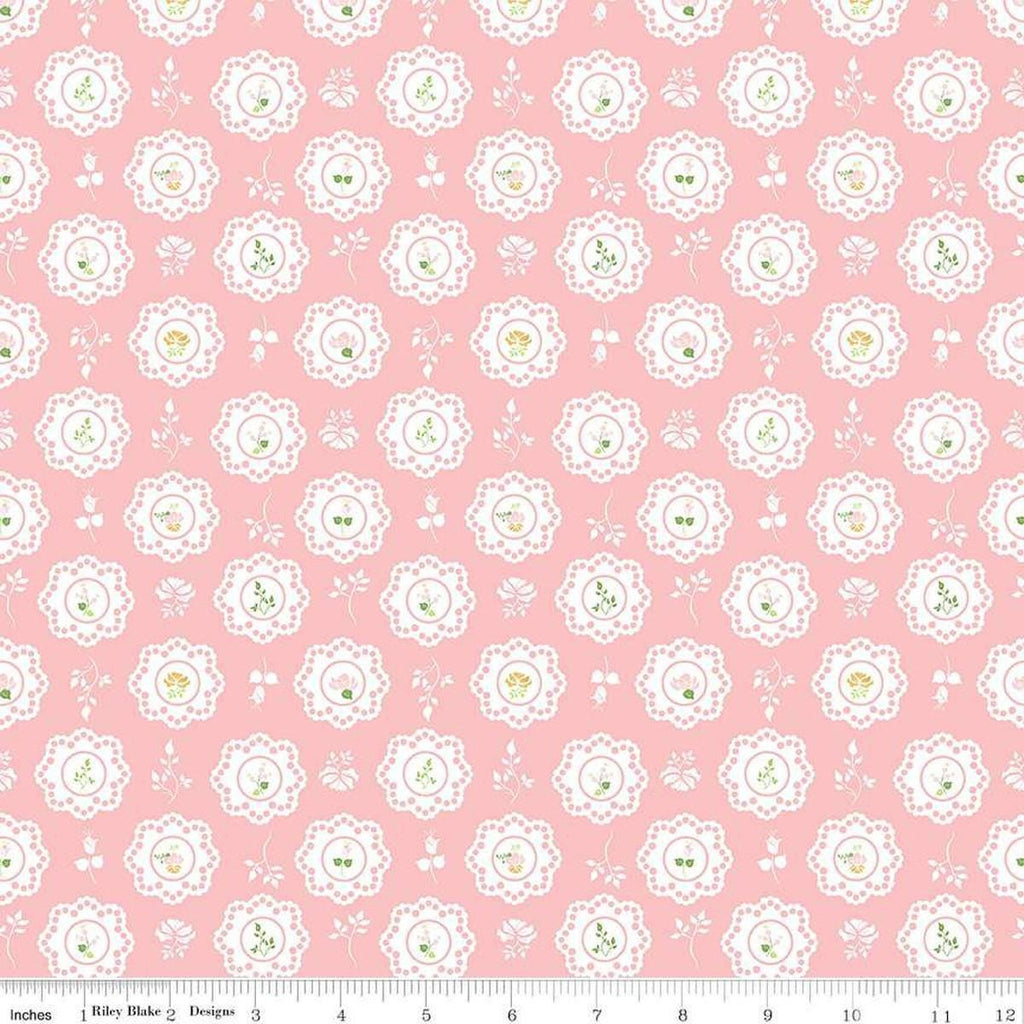 Image of the Summer Skies and Fireflies Doilies Pink Quilting Cotton Fabric by Riley Blake Designs. Features flowers on a pink background. Cute Little Fabric Shop