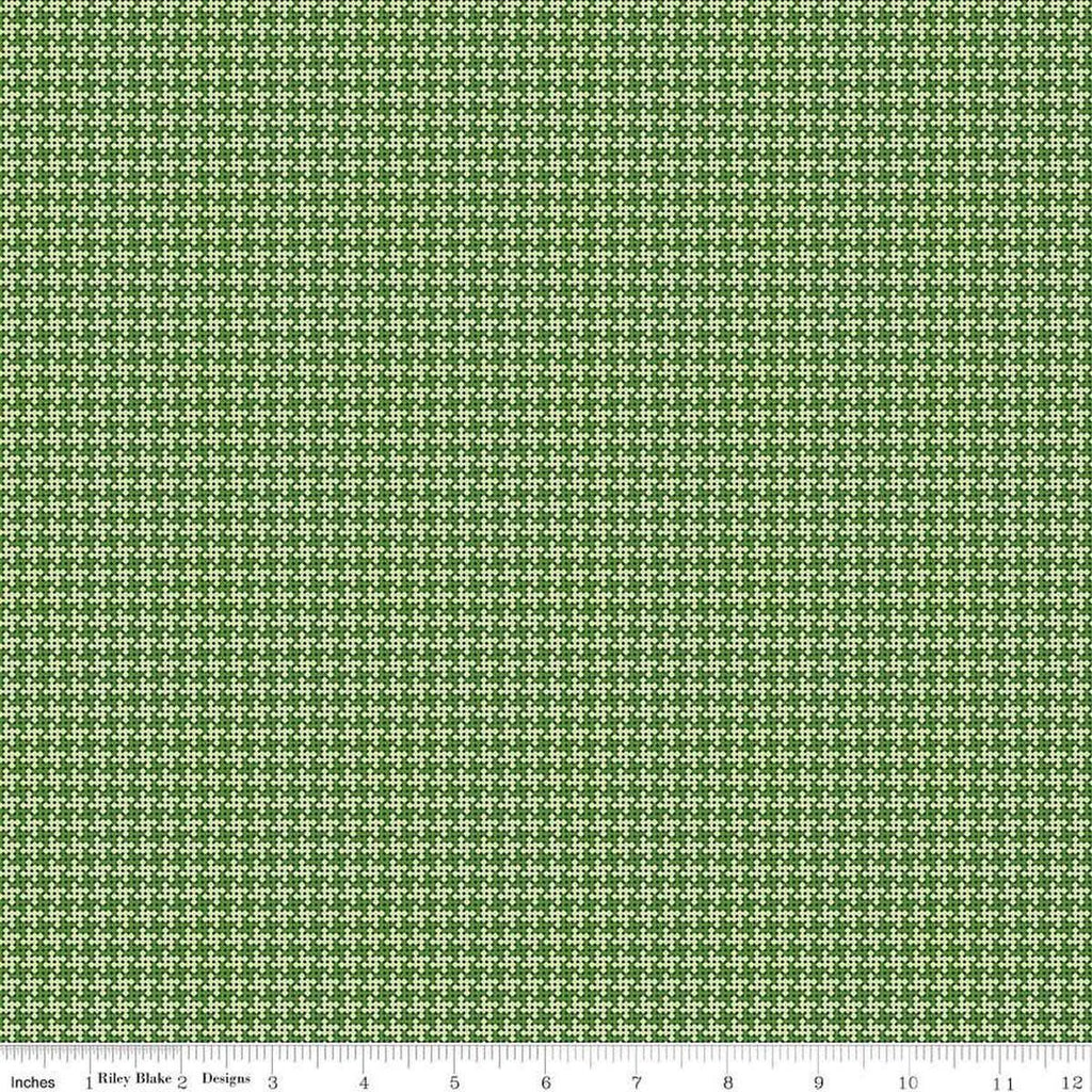 Image of the Cloudburst Houndstooth Green quilting cotton fabric by Riley Blake Designs. Features houndstooth on a green background. Cute Little Fabric Shop