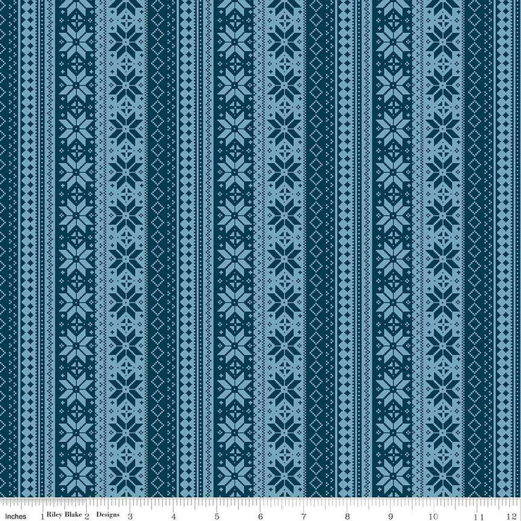 Image of the Winter Magic Sweater Stipe Navy quilting cotton fabric by Riley Blake Designs. Features stripes on a blue background. Cute Little Fabric Shop