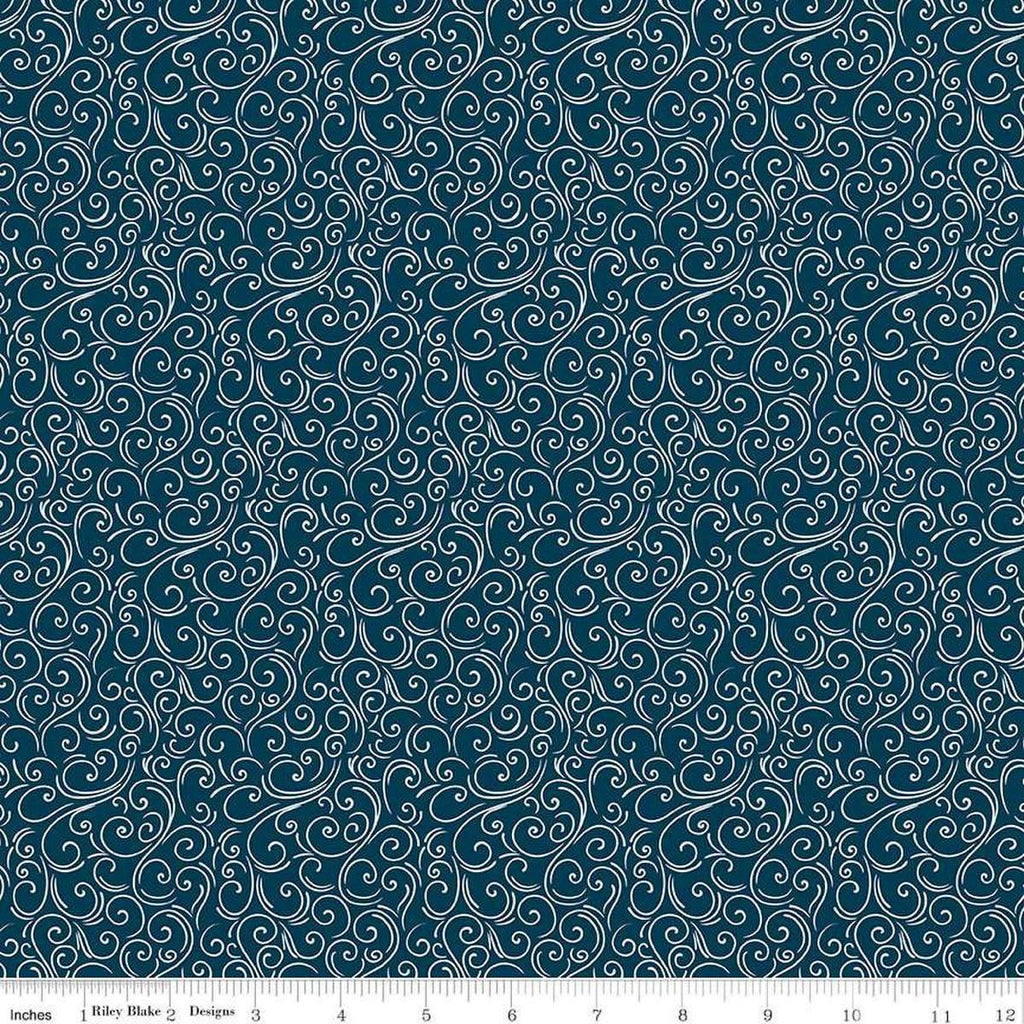Image of the Winter Magic Swirls Navy quilting cotton fabric by Riley Blake Designs. Features swirls on a blue background. Cute Little Fabric Shop