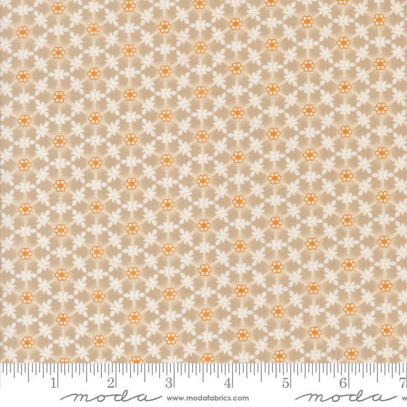 Image of the Agatha Road Wreaths Smoke quilting cotton fabric by Moda Fabrics. Features flowers on a brown background. Cute Little Fabric Shop