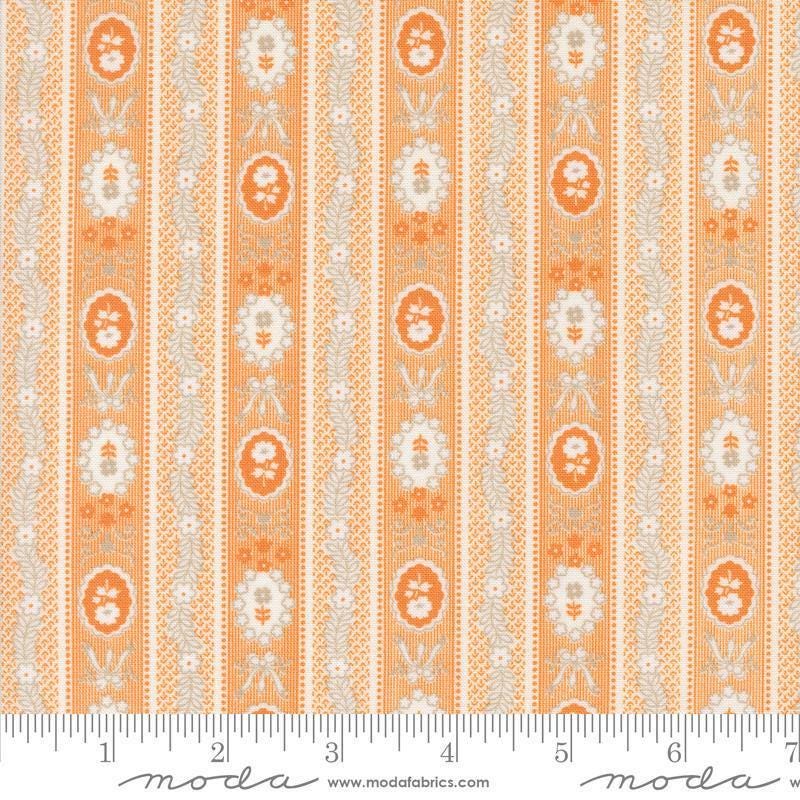 Image of the Agatha Road Wallpaper Pumpkin quilting cotton fabric by Moda Fabrics. Features flowers on an orange background. Cute Little Fabric Shop