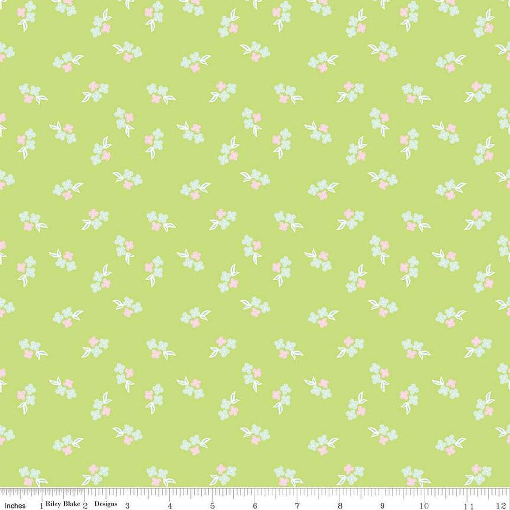 Image of the Summer Skies and Fireflies Floral Lime Quilting Cotton Fabric by Riley Blake Designs. Features flowers on a blue background. Cute Little Fabric Shop