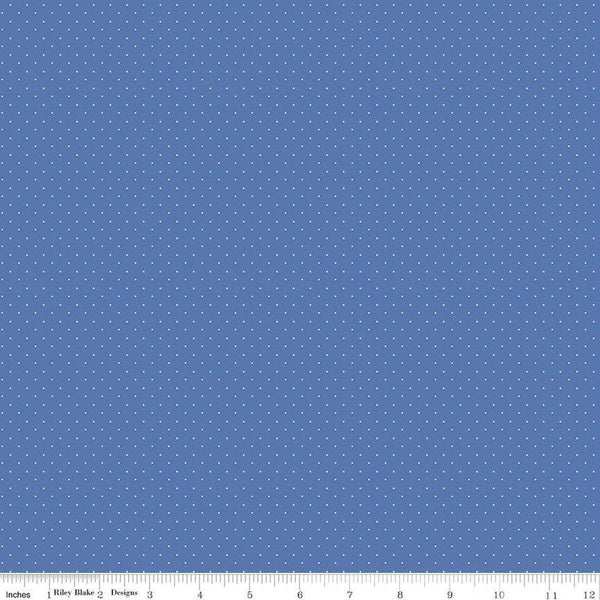 Image of the American Jane Pindots Ribbon quilting cotton fabric by American Jane for Riley Blake Designs. Features tiny dots on a blue background. Cute Little Fabric Shop
