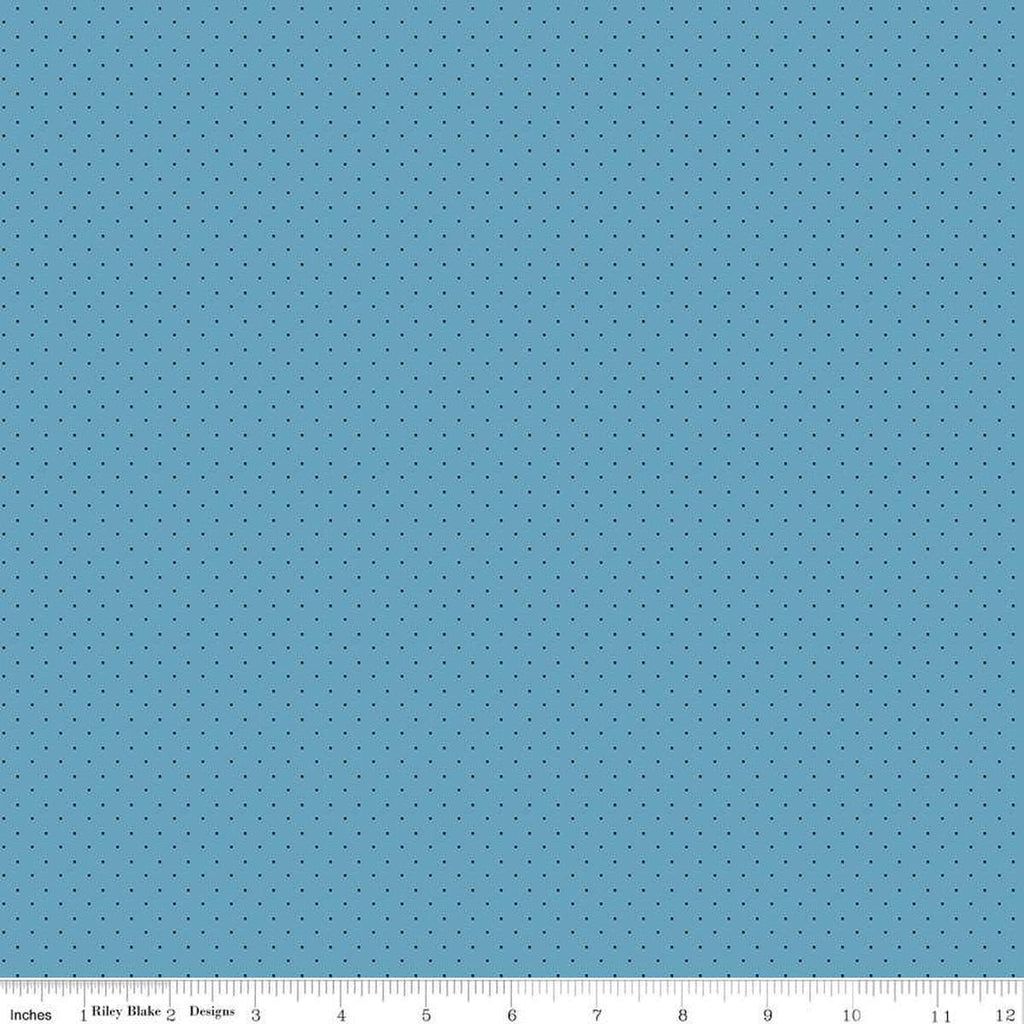 Image of the American Jane Pindots Ocean quilting cotton fabric by American Jane for Riley Blake Designs. Features tiny dots on a blue background. Cute Little Fabric Shop