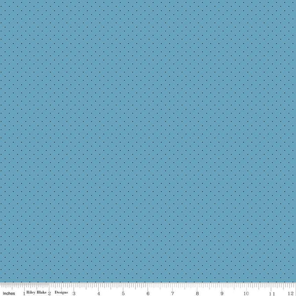 Image of the American Jane Pindots Ocean quilting cotton fabric by American Jane for Riley Blake Designs. Features tiny dots on a blue background. Cute Little Fabric Shop