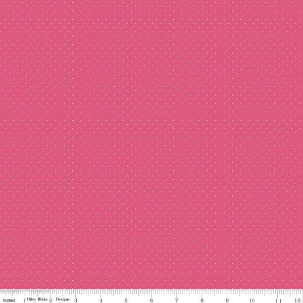 Image of the American Jane Pindots Raspberry quilting cotton fabric by American Jane for Riley Blake Designs. Features tiny dots on a hot pink background. Cute Little Fabric Shop