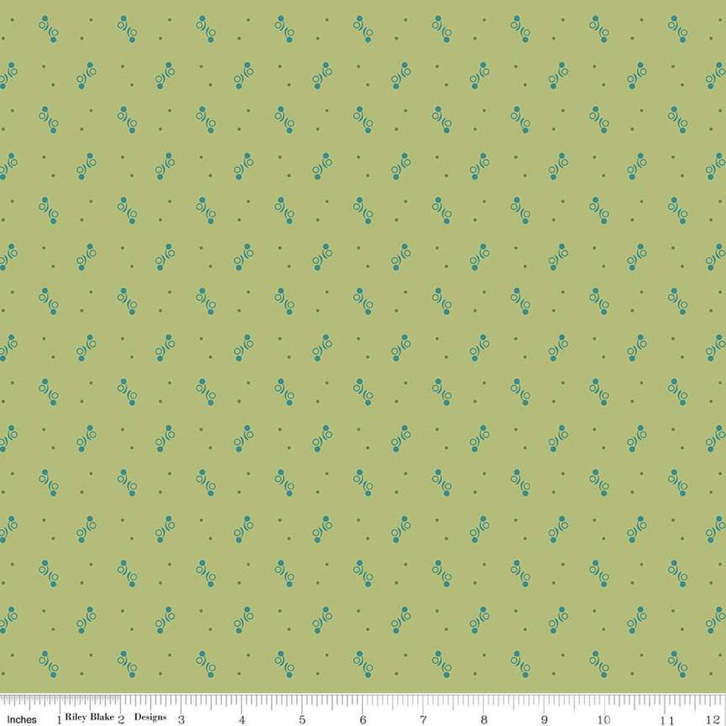 Image of the Gentler Times Ditty Lettuce quilting cotton fabric by Riley Blake Designs. Features dots on a green background. Cute Little Fabric Shop