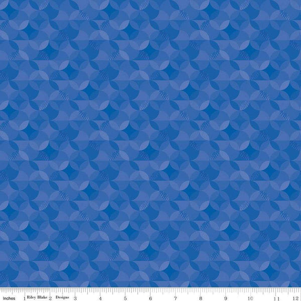 Image of the New Box of Crayons Kaleidoscope Blue Quilting Cotton Fabric by Riley Blake Designs. Features orange peel on a blue background. Cute Little Fabric Shop