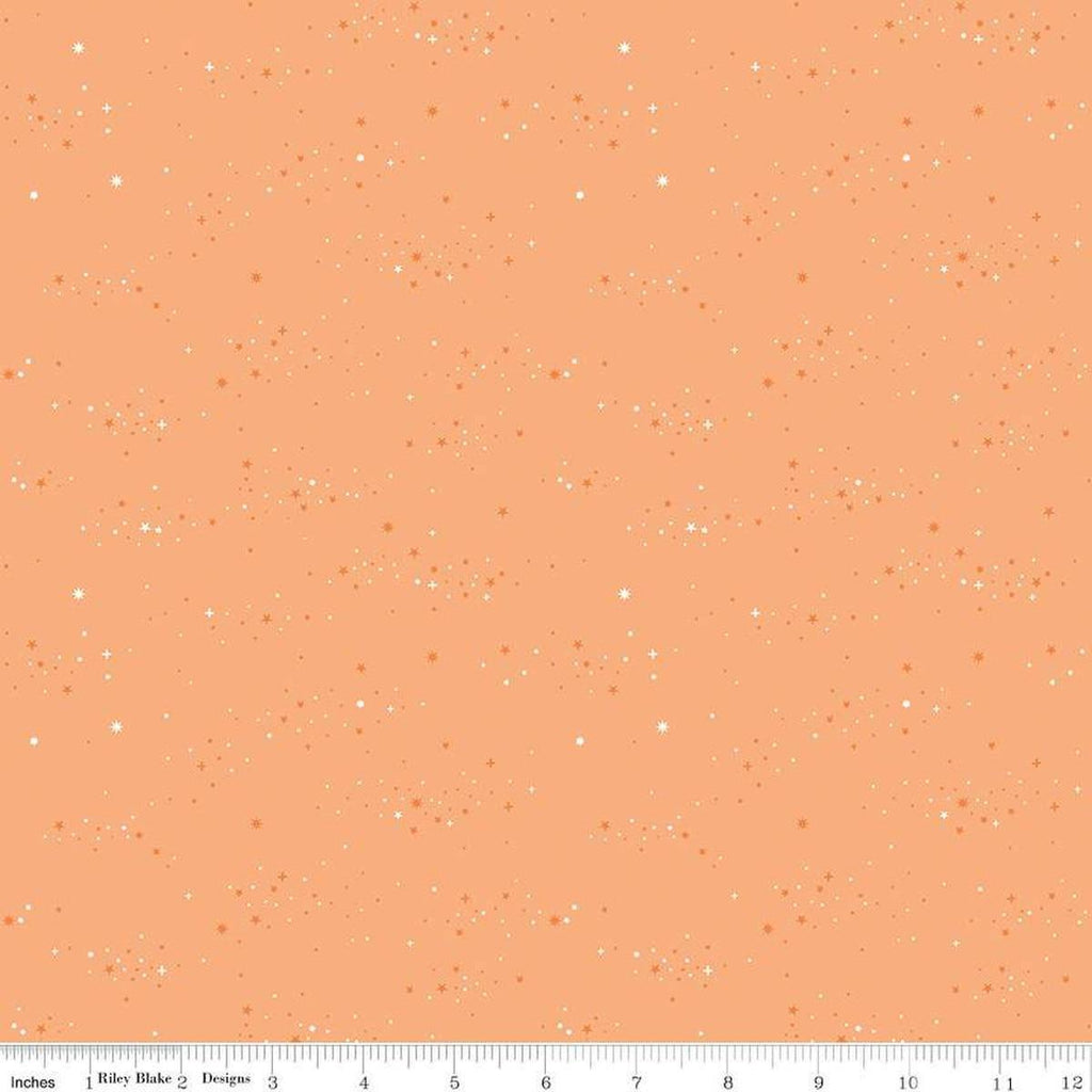 Image of Essence Starlight Marmalade quilting cotton fabric by Fran Gulick for Riley Blake Designs. Features stars on an orange background. Cute Little Fabric Shop