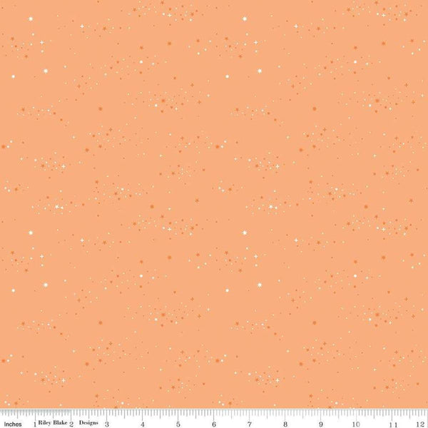 Image of Essence Starlight Marmalade quilting cotton fabric by Fran Gulick for Riley Blake Designs. Features stars on an orange background. Cute Little Fabric Shop