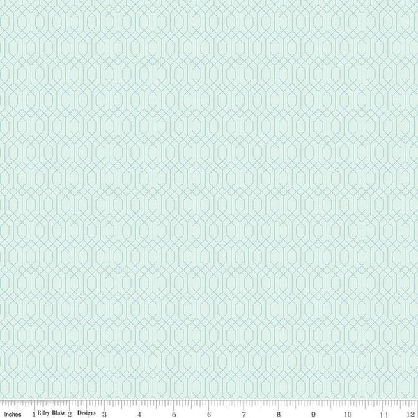 Image of Essence Lattice Iceberg quilting cotton fabric by Fran Gulick for Riley Blake Designs. Features hexagons on a blue background. Cute Little Fabric Shop