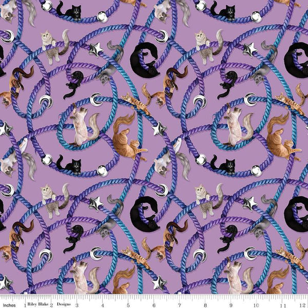 Image of Celtic Cats Main Lilac quilting cotton fabric by Brigid Ashwood for Riley Blake Designs. Features cats on a purple background. Cute Little Fabric Shop