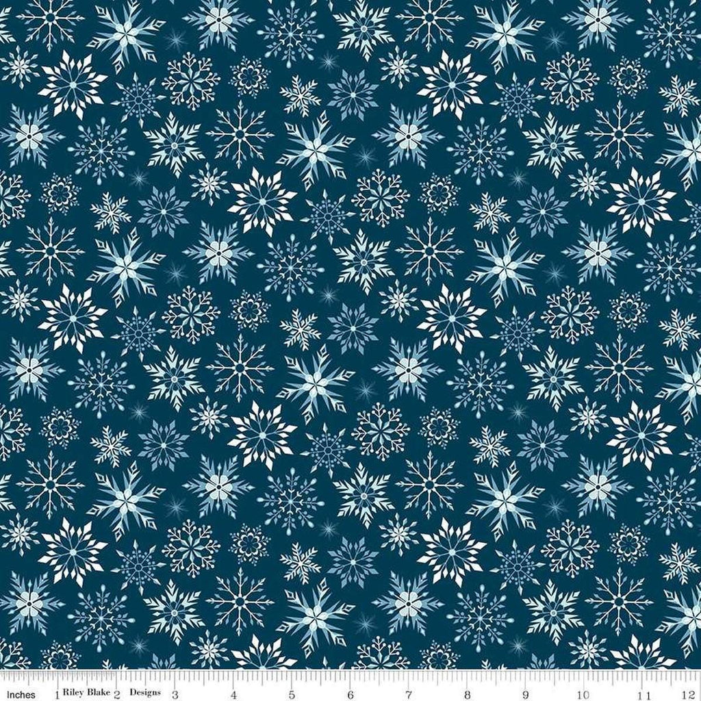 Image of Flannel Winter Magic Magic Snowflakes Navy flannel cotton fabric by Dani Mogstad for Riley Blake Designs. Features snowflakes on a blue background. Cute Little Fabric Shop