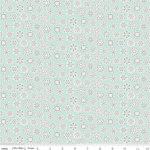 Image of Festive Greetings Snow Season quilting cotton fabric by Liberty Fabrics for Riley Blake Designs. Features snowflakes on a blue background. Cute Little Fabric Shop