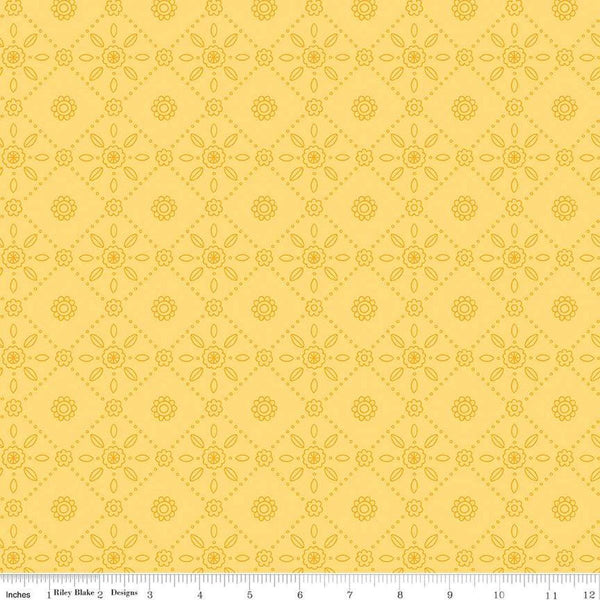 Image of Little Darlin' Folk Tile Yellow quilting cotton fabric by the RBD Designers for Riley Blake Designs. Features shapes on a yellow background. Cute Little Fabric Shop
