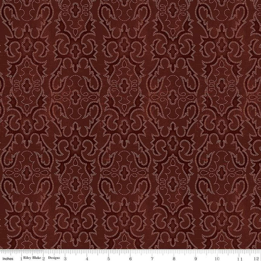 Image of John Wayne American West Boot Stitching Marsala quilting cotton fabric by Riley Blake Official Product for Riley Blake Designs. Features printed embroidery on a red background. Cute Little Fabric Shop