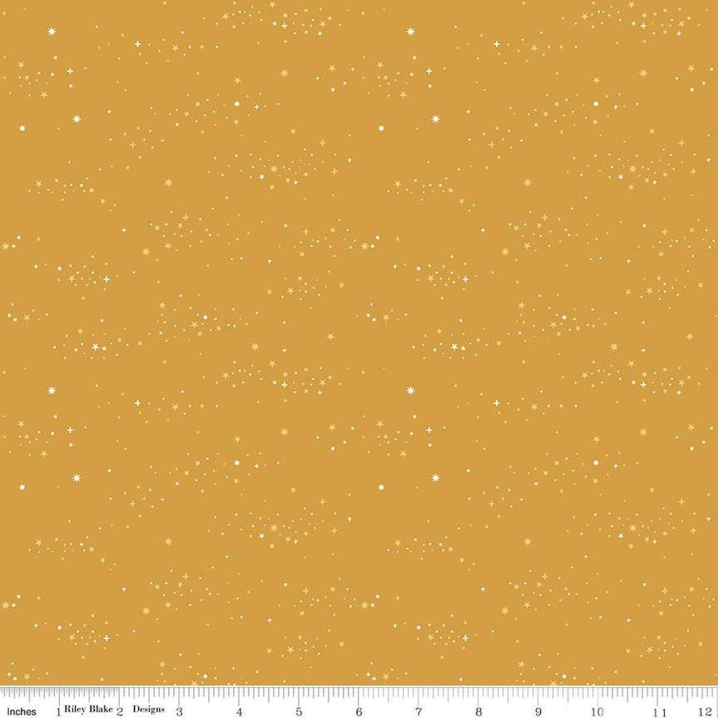 Image of Essence Starlight Golden quilting cotton fabric by Fran Gulick for Riley Blake Designs. Features stars on a yellow background. Cute Little Fabric Shop